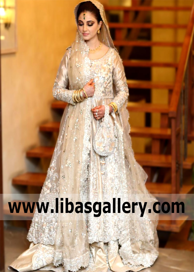 Captivate those around you with the beauty of the silhouette and luxurious character of the image in a Tena Durrani Bridal Gowns Wedding Gowns Lawrenceville New Jersey NJ US Heavy Embellished Bridal Dupatta. They make the hearts of our brides beat faster.