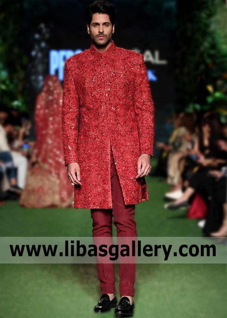 Liven up your Sherwani suit selection with our Tayab Moazzam Durrani High Quality Sherwani for Mens Newcastle London UK Red Wedding Sherwani suit from our BCW Collection. Iconic and symbolic, the embroidered with glorious embellishments Raw silk fabric is an exclusive design. Ideally worn during the autumn/winter and spring season, our Sherwani suit is a must-have in your wedding wardrobe.