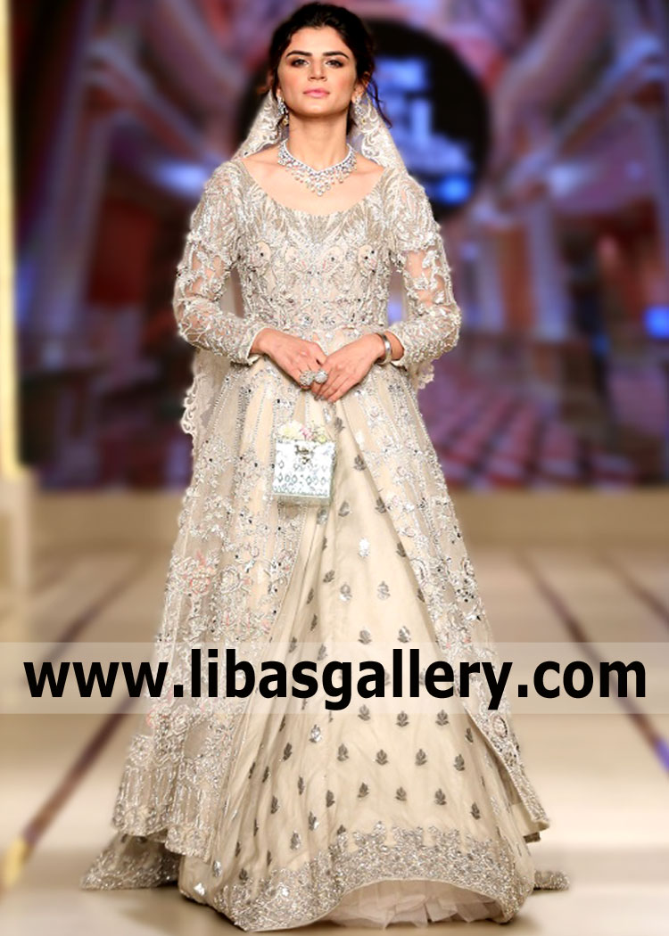 Check out these absolutely stunning photos of one of our first ever Pakistani Wedding Dresses Austin Texas USA Puffy Wedding Lehenga Designs Ayesha and Usman Wedding Dresses from Pantene HUM Bridal Couture Week. Zubab Rana certainly rocks our Ayesha and Usman gown With an extra layer of sequins under the tulle of the Lehenga skirt, you will shine from every angle.