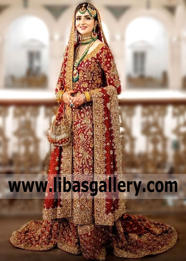 For your dazzling look, we have prepared a luxurious wedding dress with incredibly beautiful glitter Bridal Gharara from Dr Haroon. Just imagine what a sensation you will make in this luxurious Bridal Dress Dr Haroon. You will be amazing. A wedding dress with a year silhouette with a train creates a gentle and majestic image at the same time. Discounts continue, but there are fewer and fewer promotional Pakistani Bridal Gharara dresses. Hurry up to shop your wedding dress at a great price.