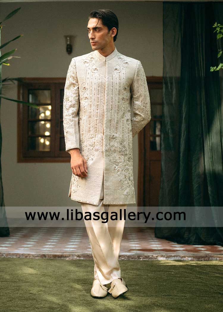 Royal beige hand embellished groom sherwani with luscious ivory kurta trosuers inner  