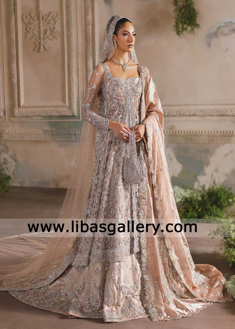 Champagne Peach Pakistani Bridal Lehenga with Train and front open Peshwas hand embellished with Zardozi work dupatta pouch UK USA Canada Dubai Champagne Peach Pakistani Bridal Lehenga with Train and front open Peshwas hand embellished with Zardozi work dupatta pouch UK USA Canada Dubai