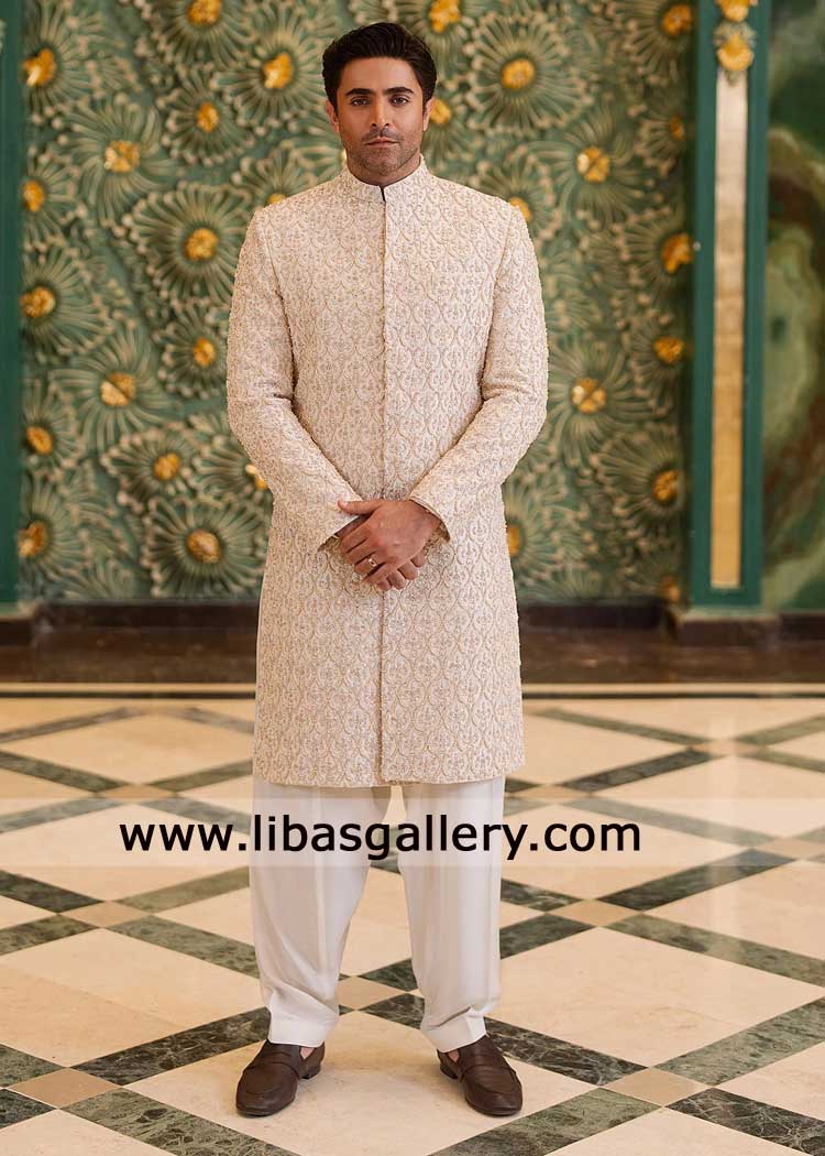 ivory luxury raw silk groom sherwani with exquisite hand work by Artisans paired with kurta tailored trouser Memphis Baltimore Birmingham Dubai ivory luxury raw silk groom sherwani with exquisite hand work by Artisans paired with kurta tailored trouser Memphis Baltimore Birmingham Dubai
