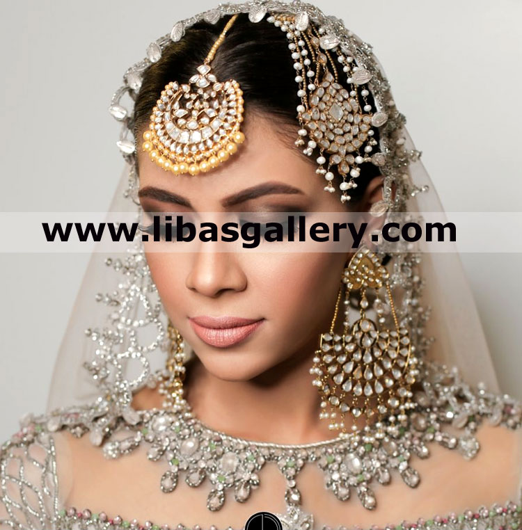 Shy bride in latest design of bridal jewellery set for nikah walima including stones high quality pearls beads tika necklace jhumer earrings jeddah riyadh saudi arabia