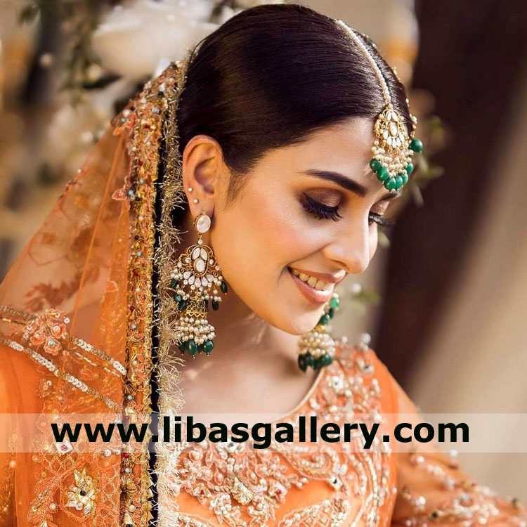 Great women ayeza khan sitting in garden in Pakistani Wedding Jewellery Set tika earrings pearl kundan etc chicago sugarland texas USA