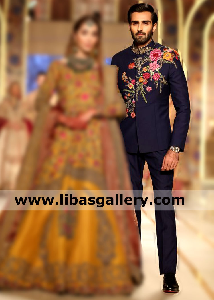 dark blue prince coat hasnain lehri showing which has colorful resham thread embroidery on left panel front and gold work on collar france dubai germany
