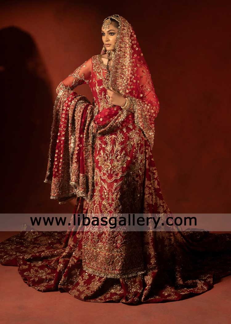 Bridal Silk trail lehenga Dress in Raspberry Red with Bridal Shirt hand Artistry bridal dupatta grandeur Rust Green touch Qatar Saudi Arabia UK USA