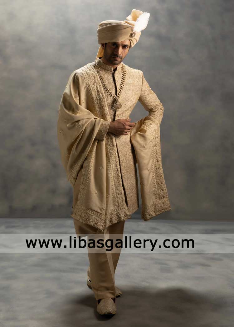 Groom Sherwani Royal beige crafted from premium fabric, hand embellished paired with turban shoes shawl