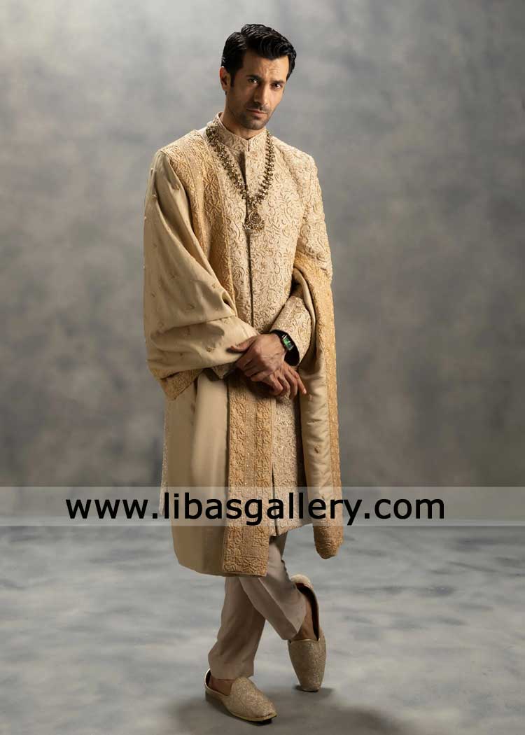 Majestic Beige Gold sherwani crafted from premium fabrics and rich hand embroidery paired embroidered shawl shoes