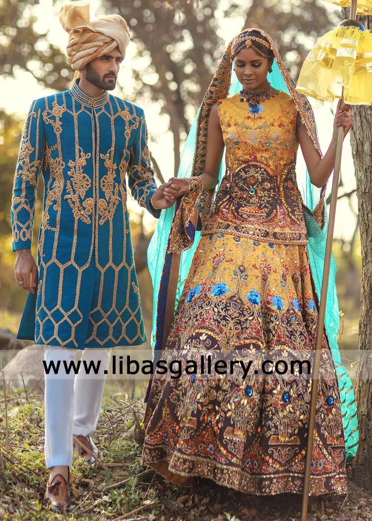 Groom Royal blue Raw silk sherwani with intricate gold hand embellishment on front collar sleeves with royal glam Washington Glasgow Dubai