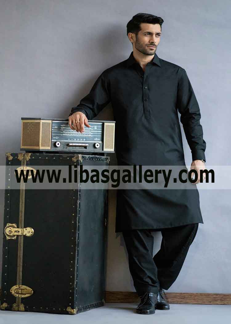 Jet black Kameez Shalwar for gents made with high quality fabric stitched by master Tailor Doha Abu az Zuluf.Qatar 