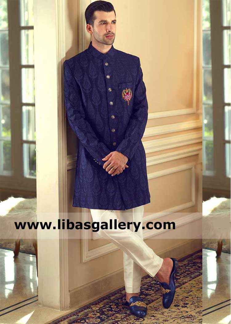 Men Vibrant blue self embroidered short length Style Occasion sherwani with hand embroidered motif on pocket paired with off white inner Riyadh Jeddah Dammam Saudi Arabia