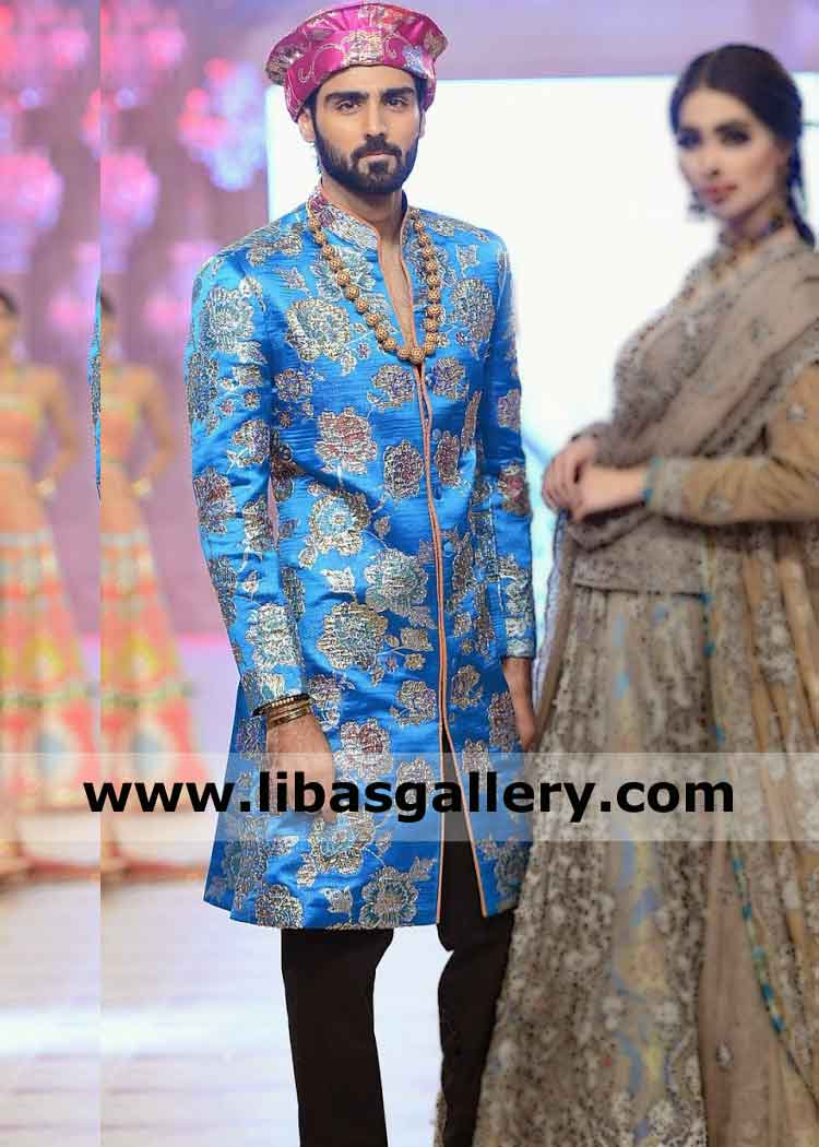 Hasnain lehri in Men Beautiful Blue Sherwani Article with black pants for party and occasion bespoke male sherwani shop UK USA Canada