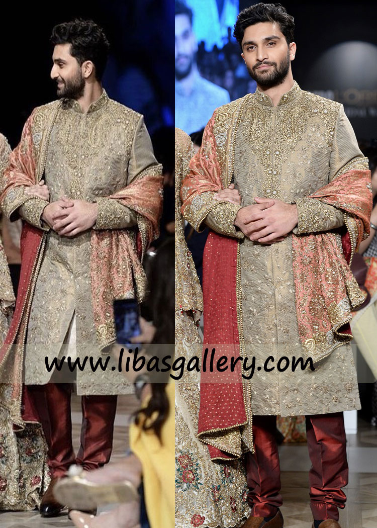 Ahad razamir in sherwani suit embellished front and sleeves collar walking on ramp with sajal aly his wife UK USA Canada Ahad razamir in sherwani suit embellished front and sleeves collar walking on ramp with sajal aly his wife UK USA Canada