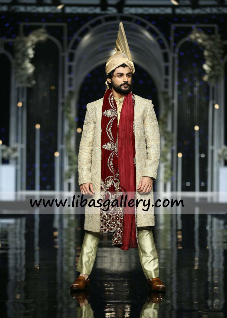 Dulha raja watching audience in golden embellished wedding sherwani thread kora stones work UK USA Canada Australia Dubai Dulha raja watching audience in golden embellished wedding sherwani thread kora stones work UK USA Canada Australia Dubai