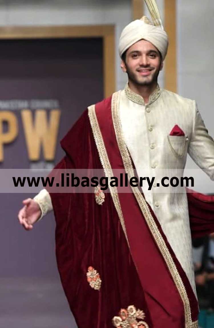 off white punjabi style shadi kulla with gold shade fan for happy dulha bhai groom ready for nikah barat culture dubai saudi arabia qatar