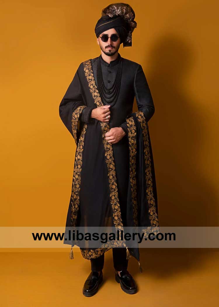 Expertly Tailored Black Sherwani to make a Regal statement paired with Maysuri Net black and Gold Shawl Black Turban and inner California Dundee Dubai Sydney Toronto