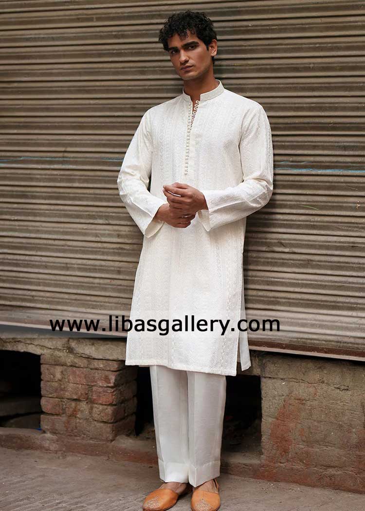 white raw silk men kurta refined Resham embroidery with plain shalwar set with clean structure and fashion versatility Abu dhabi London Austin USA white raw silk men kurta refined Resham embroidery with plain shalwar set with clean structure and fashion versatility Abu dhabi London Austin USA